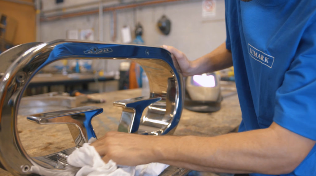 lumark Brisbane boat builder works on a part of a vessel